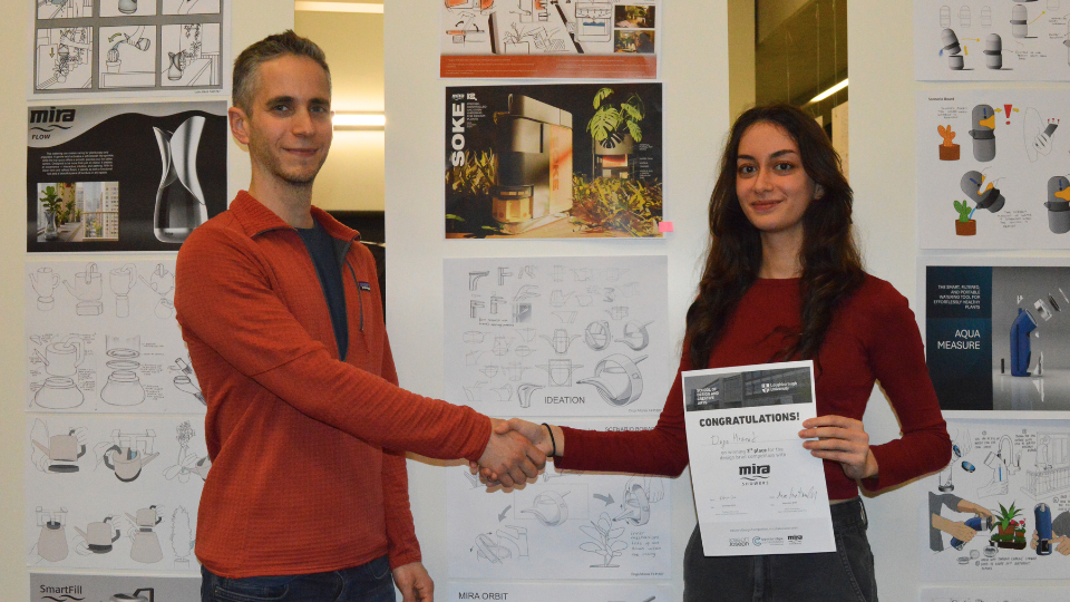 Doja Mizrak accepting an award for 3rd place with Kohler Mira