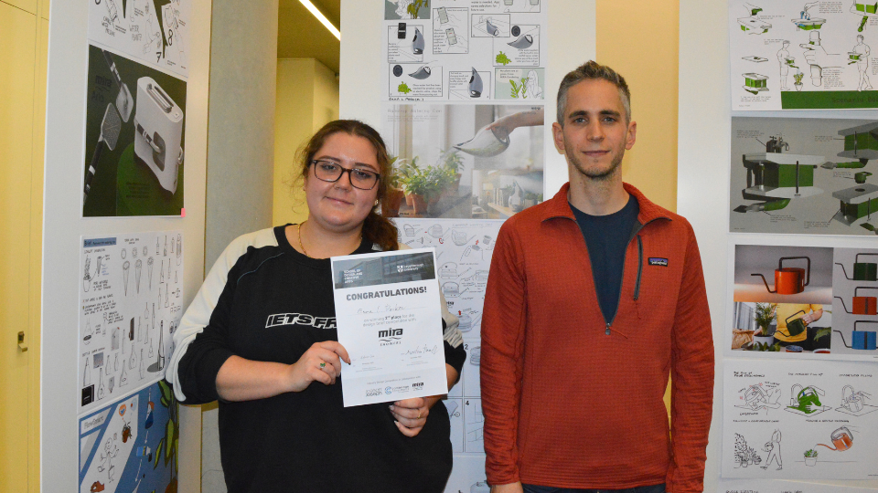 Emma Parker accepting an award for 2nd place with Kohler Mira