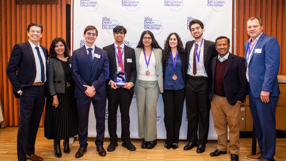 Damini and her team stood together for a photograph with their award