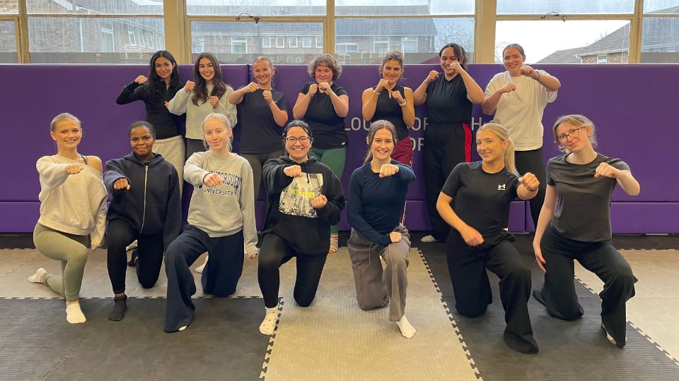 Attendees posing for a group photograph