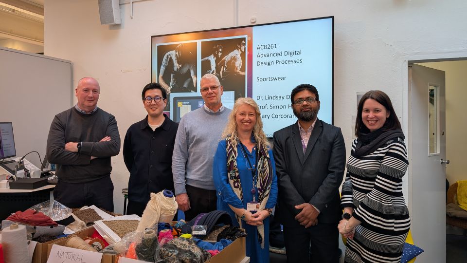 Shima staff stood with SDCA staff in a group photograph