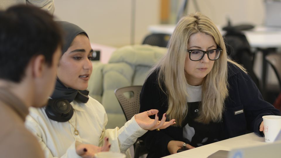 Staff and students speaking at UXathon 2025