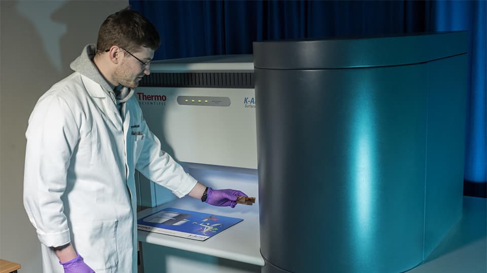 male in lab coat in the LMCC