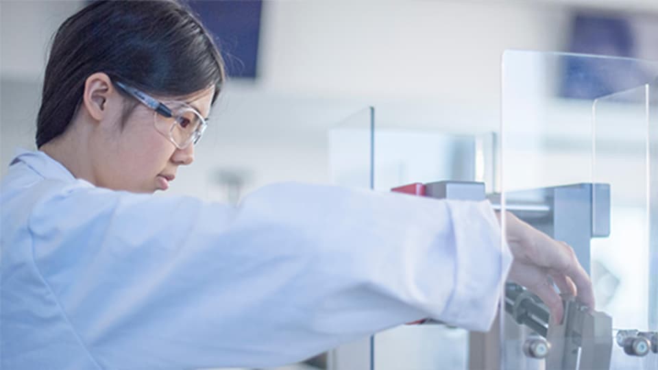 image of female student working in a lab
