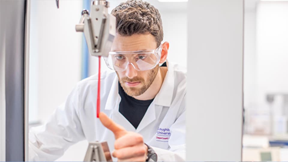 image of male student working in lab