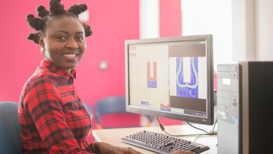 Juliet sat at a computer