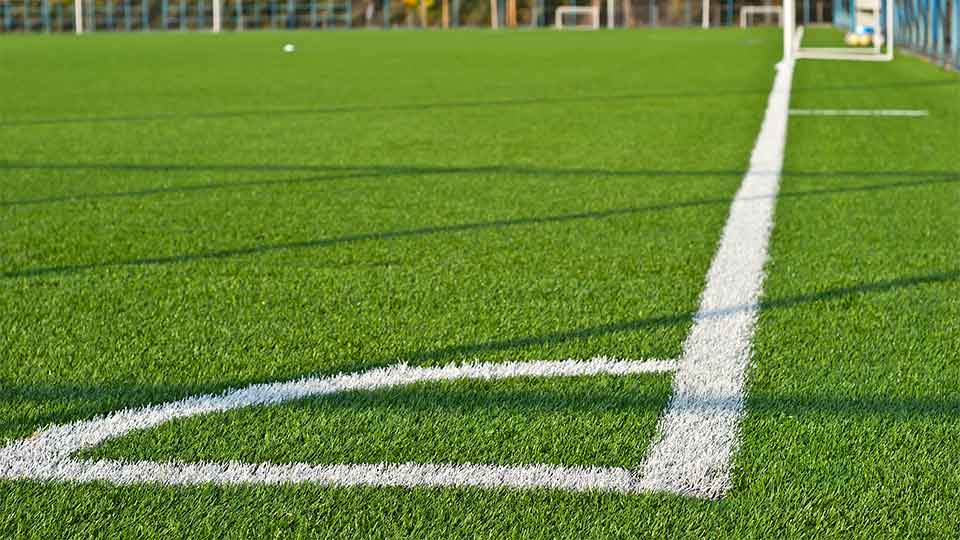 Close up of artificial grass on a football pitch