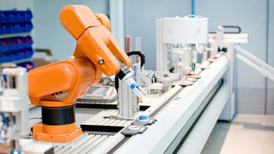 A computer controlled automated manufacturing process taking place in a lab.