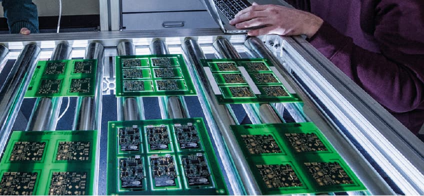 Intricate Manufacturing Engineering with person on a computer