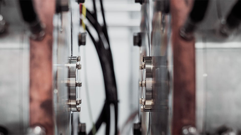 Extreme close-up of a metal turbine.