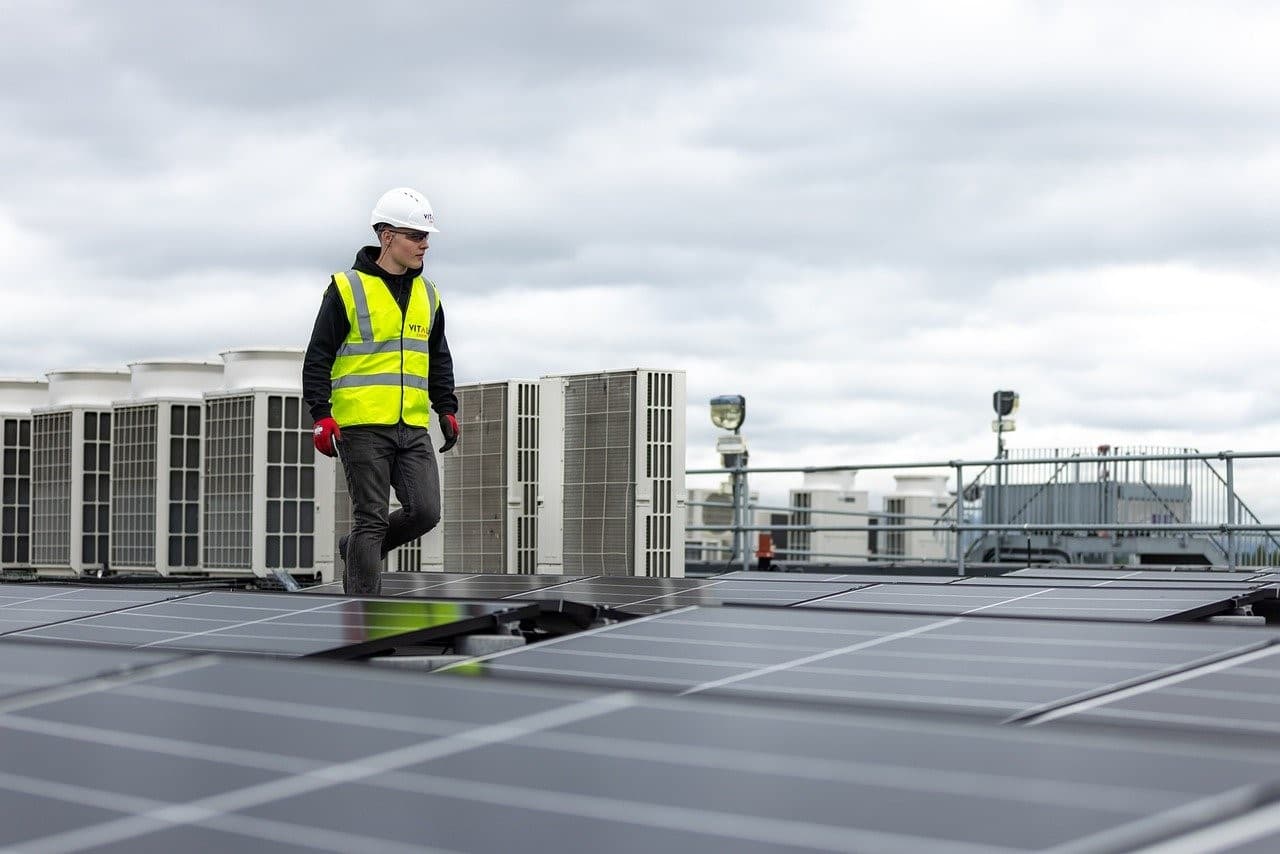 Engineer working on the roof of a building