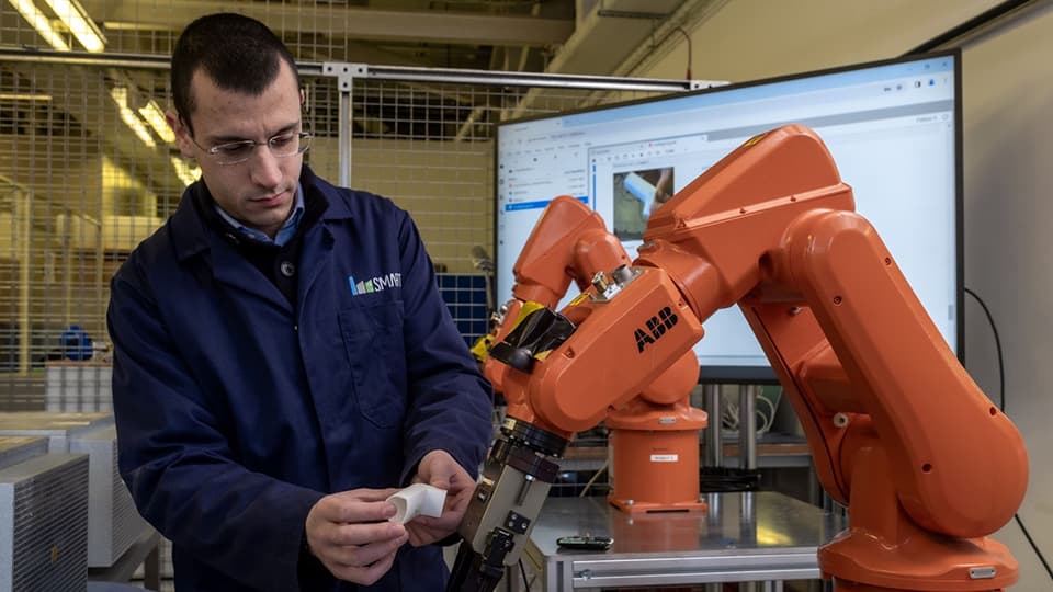 Engineering with robotic manufacturing arm