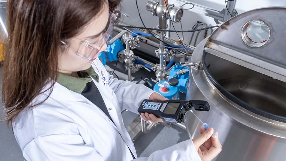 Student working on equipment in engineering lab