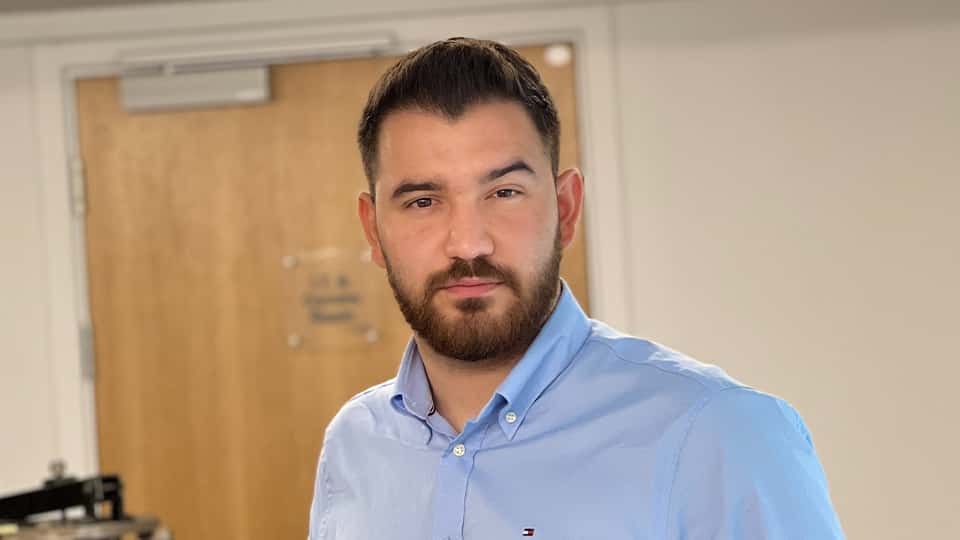 Andrei stood in engineering lab