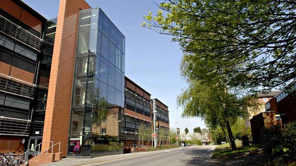 Outside the Wolfson Building of Engineering at Loughborough University on a sunny day
