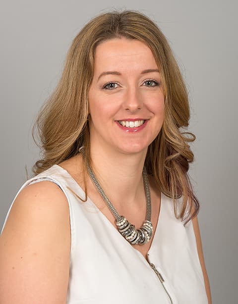 Portrait photo of Caroline Sutton