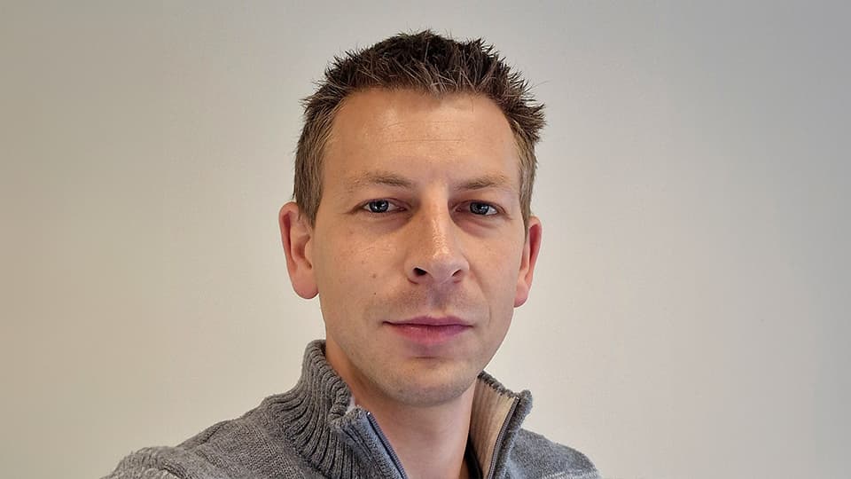 Andy against cream background