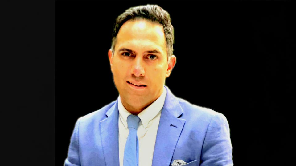 Ehsan Sabet in a suit