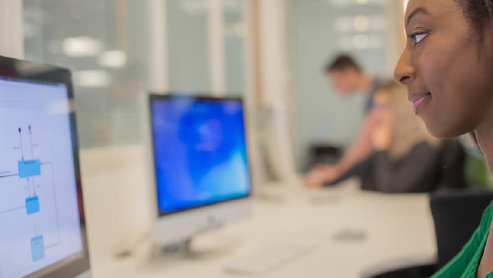 a student in front of a computer