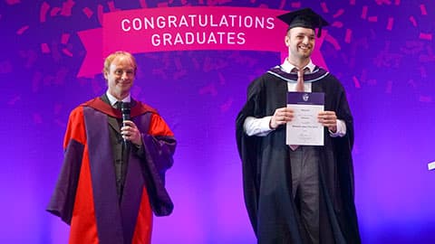 Dr Brian Winn with prize winner Harry Scott