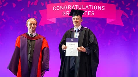 Dr Brian Winn with prize winner Meirion