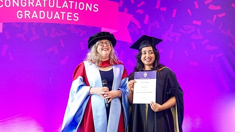 Prof Sandie Dann with prize winner Simona