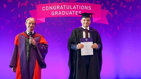 Dr Brian Winn with prize winner Harry