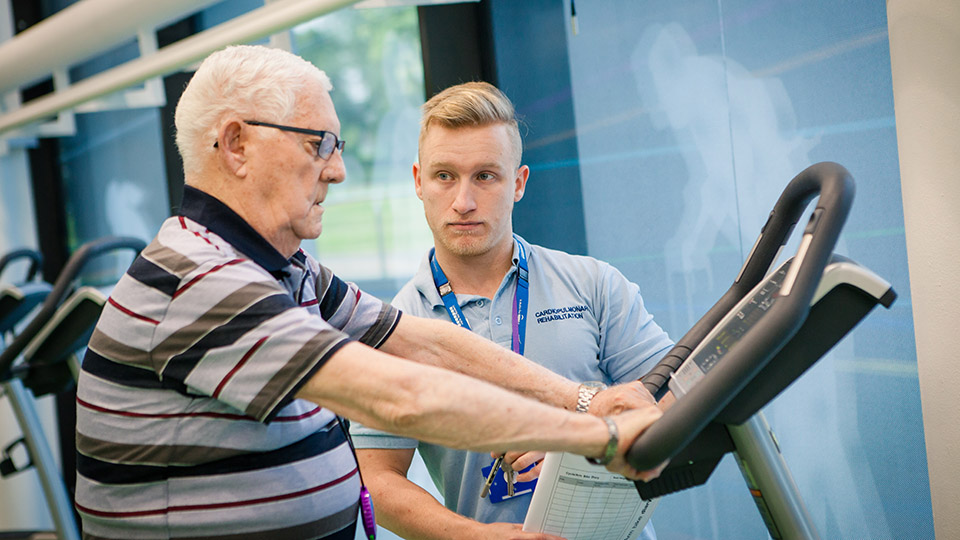 PhD student providing support to elderly patient