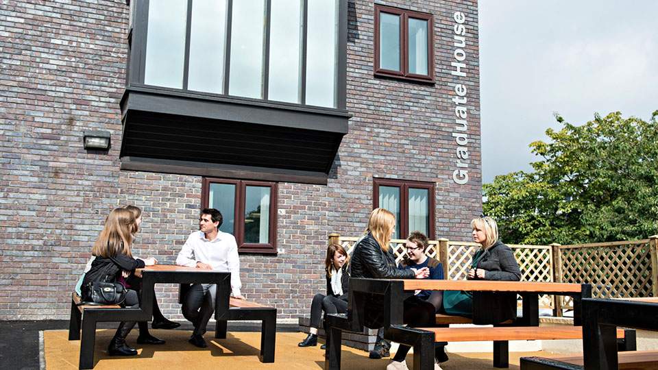 Students talking outside The Graduate School