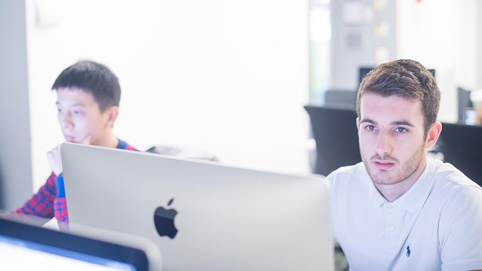Students working on a computer