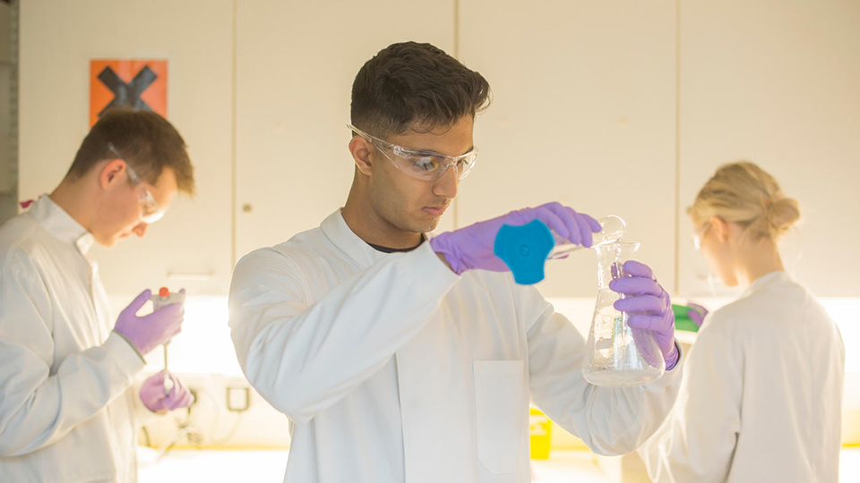 Student conducting research in a lab