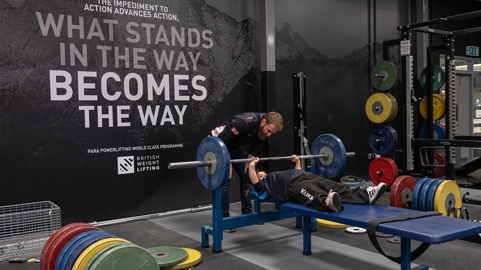 Weightlifter and coach