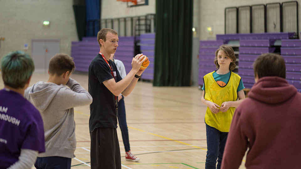 Teacher delivering a PE class