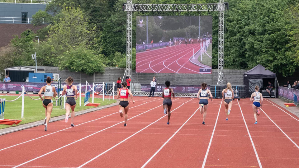 Athletes competing in athletics meet