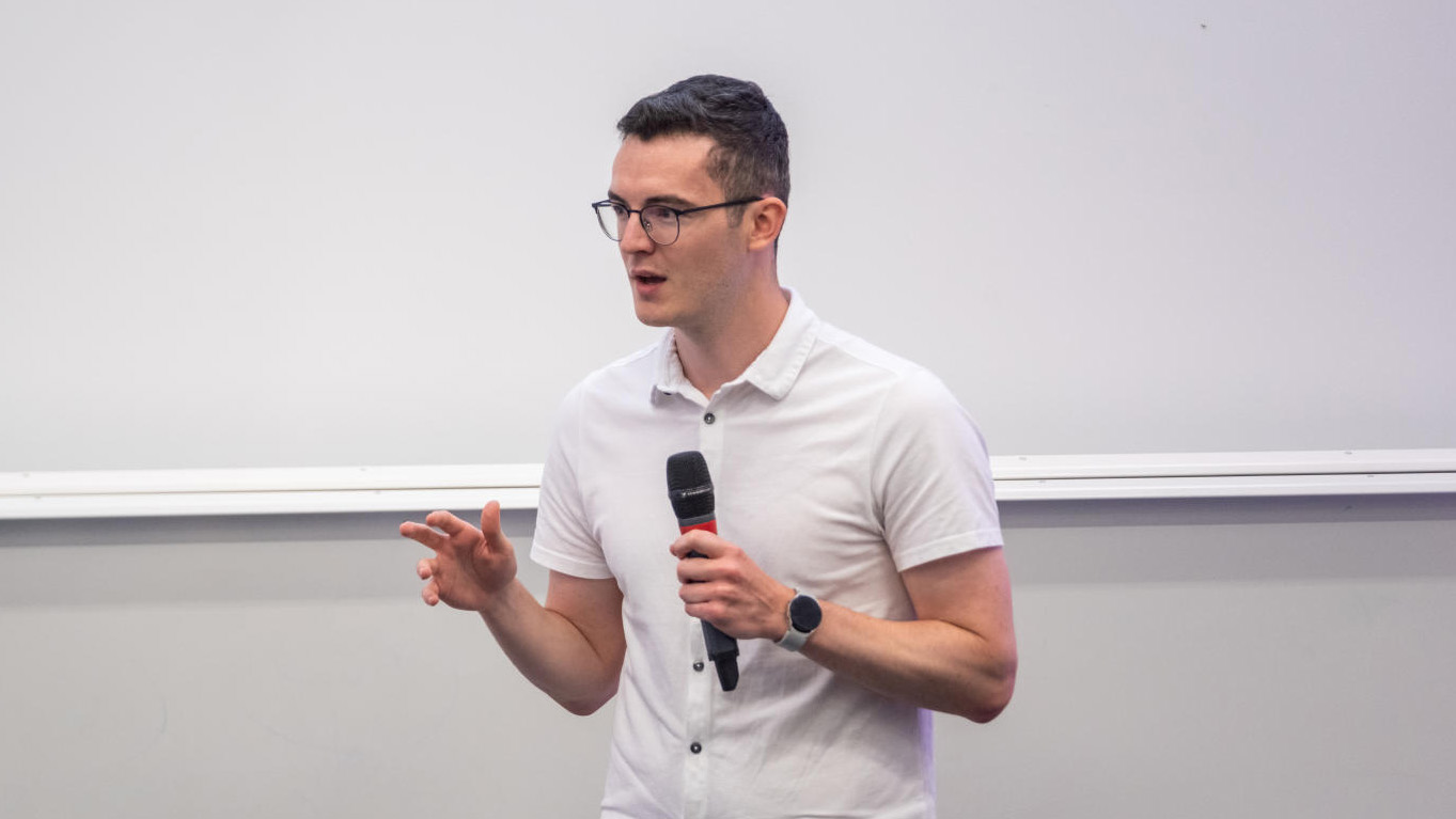 Doctoral researcher Matthew Putland presenting