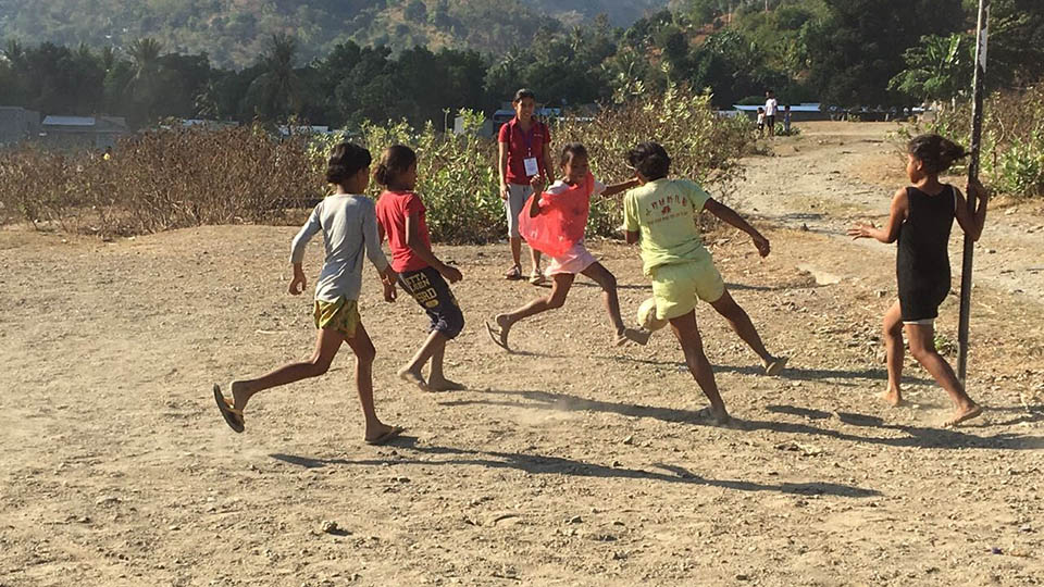 Children playing football on sand. Photo credit: UC Berkeley and Loughborough University