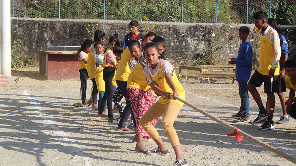 Children competing in a tug-of-war. Photo credit: Right4Children