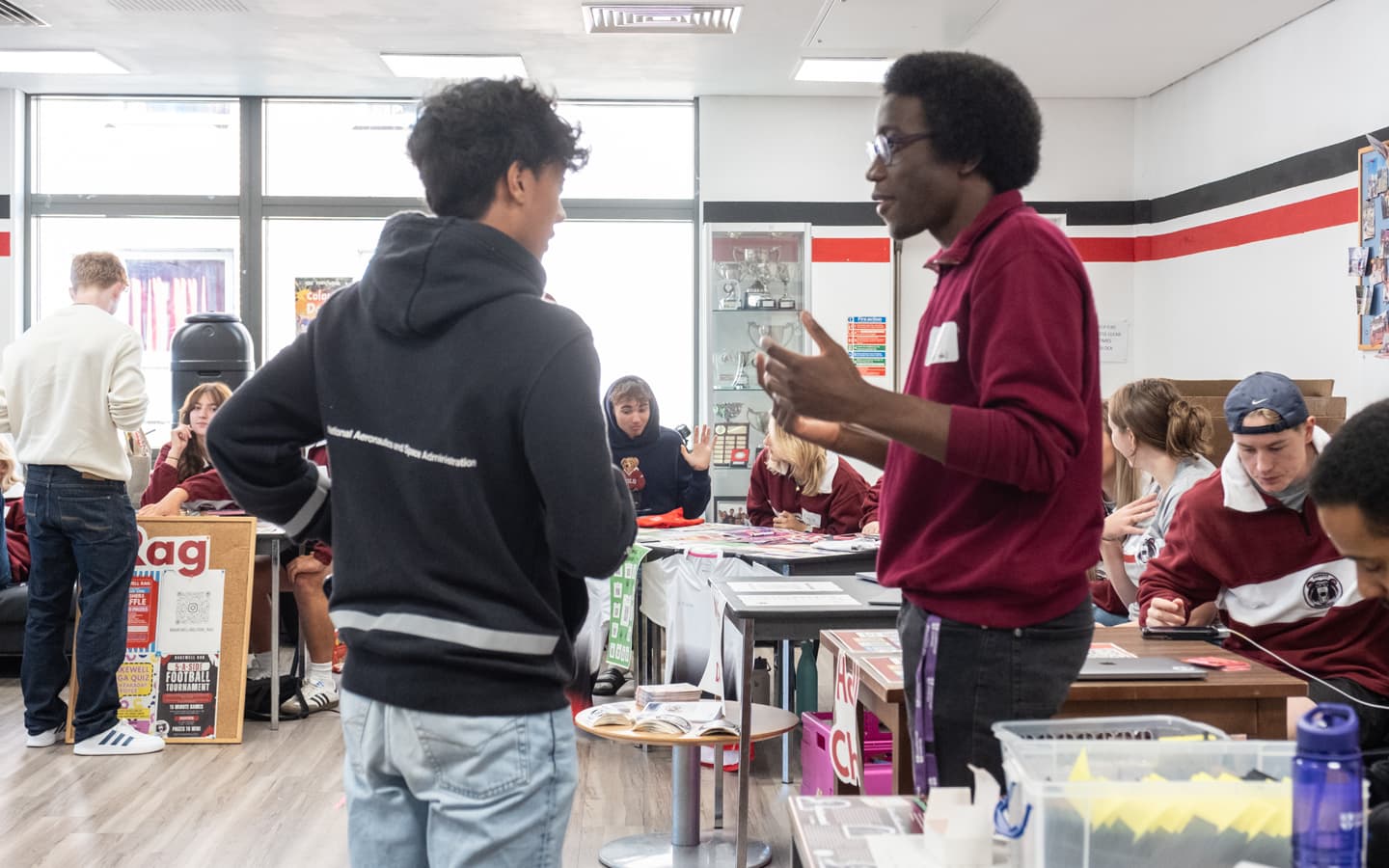 Subwarden at Robert Bakewell telling a new student about the support available