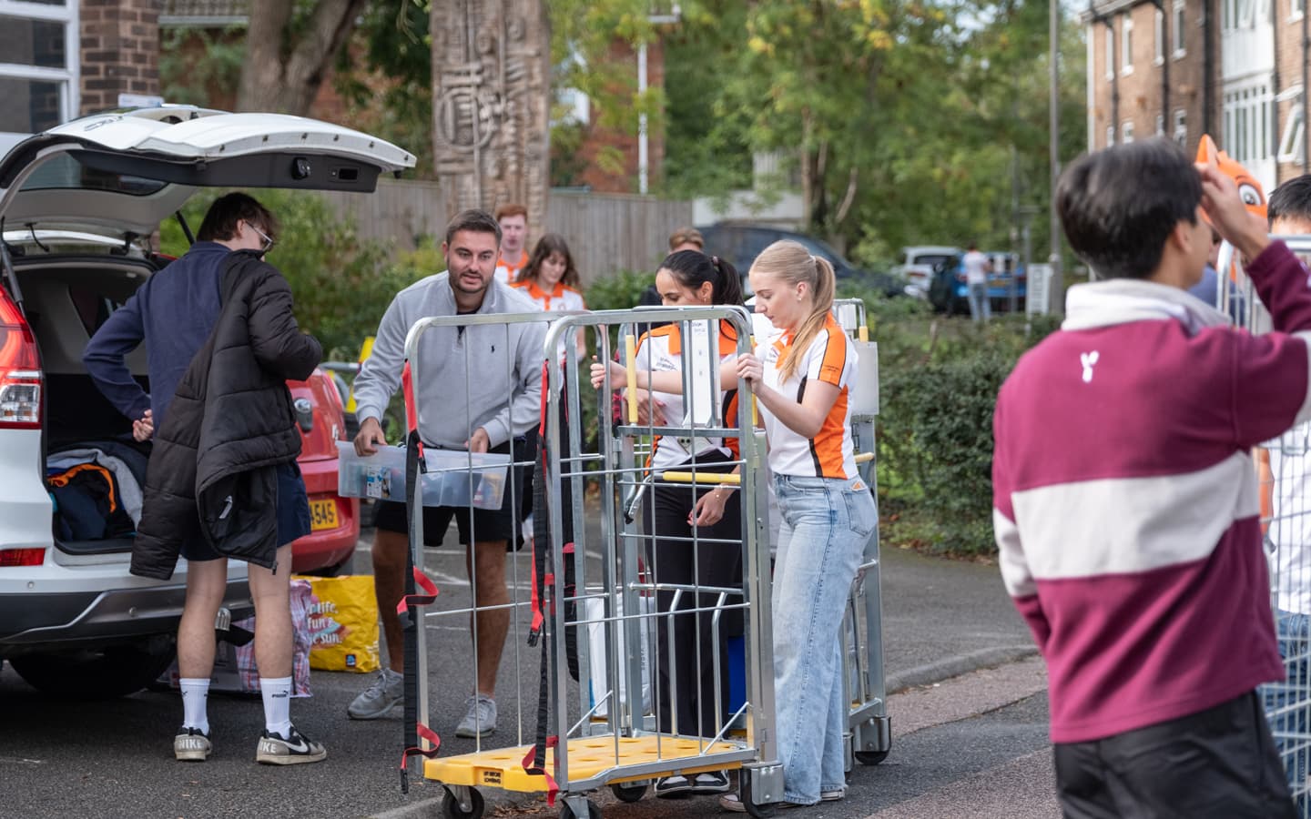 Faraday hall committee assisting with arrivals