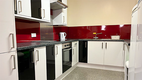 Kitchen in Butler Court halls of residence at Loughborough, fully equipped with oven, hob, kettle and microwave