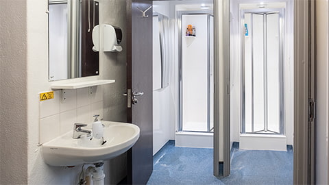 Some of the shared showers in Cayley traditional student halls of residence