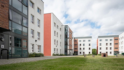 Exterior view of Elvyn Richards student accommodation looking onto a grass courtyard
