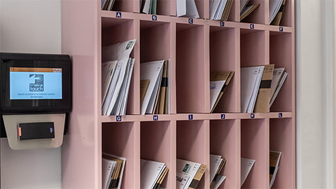 Post slots in Telford hall reception for students to collect letters