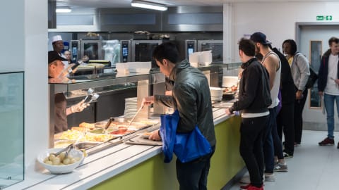 Students getting food in the Towers dining hall