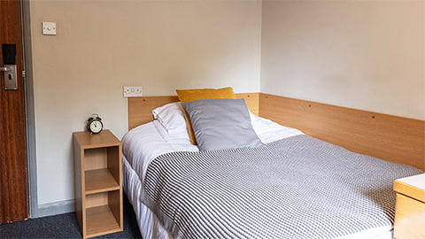 Comfy bed in a William Morris standard bedroom
