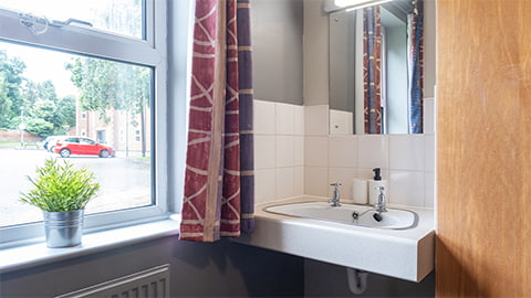 A helpful washbasin inside standard bedrooms at William Morris student accommodation at Loughborough University