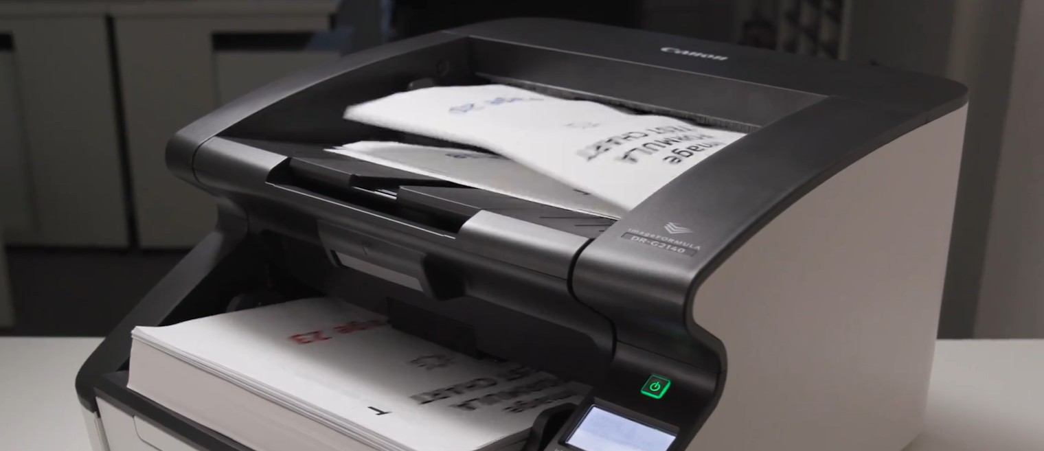 Scanner with papers running through