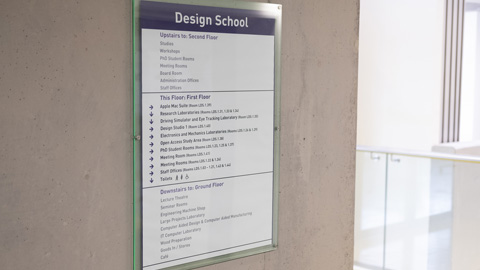 A large sign in the Design School