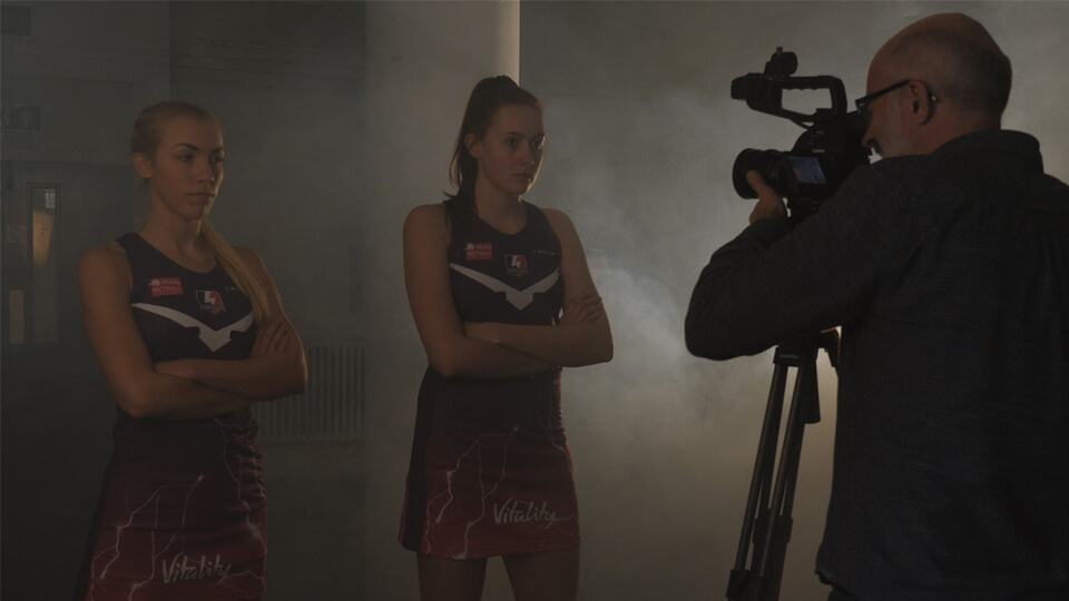 filming two netball players