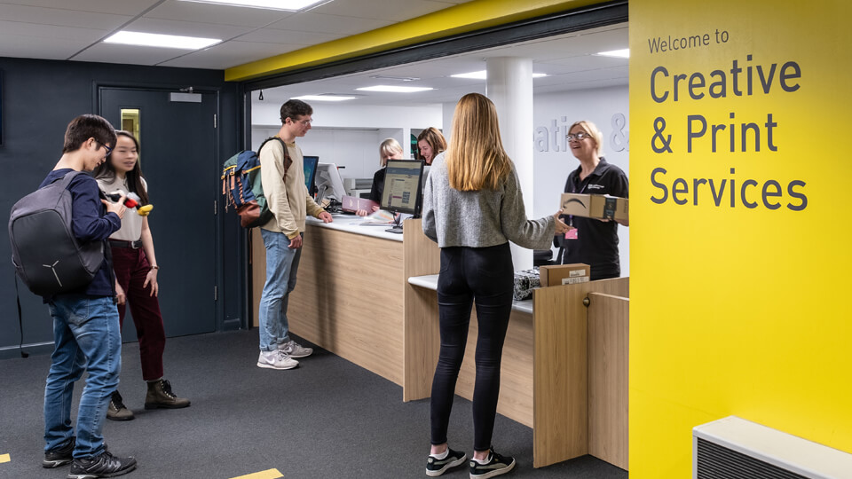 the desk at creative and print services